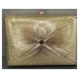 Judith Leiber starburst crystal & gold tone metal