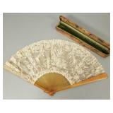 Antique lace fan in tooled leather case marked