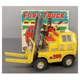 Japan tin friction toy fork truck with box
