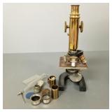 Antique Bausch & Lomb microscope in wood case-