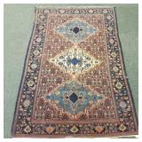 Vintage hand tied oriental rug- approx 4.5