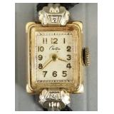 Vintage ladies 14k gold Croton watch w/ cord band-