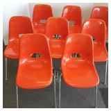 8 Krueger mod orange stacking chairs