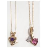 Two 10k pendants on chain set with diamonds, etc