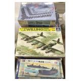 Group of models in boxes- ships, etc.