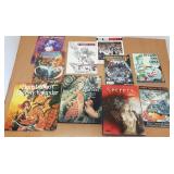 Group of art books on tattoos, etc