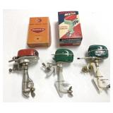 Group of toy boat motors, boxes, etc.