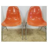 2 Herman Miller fiberglass stacking chairs
