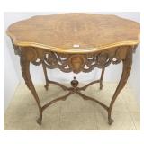 Antique carved walnut parlor table