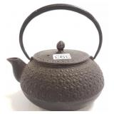 Oriental cast iron teapot