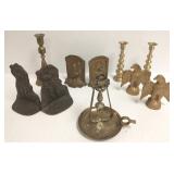3 sets of vintage bookends and 4 brass