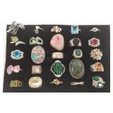 25 rings - most set with stones, some silver