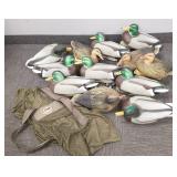 Group of duck decoys in canvas bag