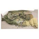 Large group including military bugs, canteen,