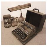 Vintage Remington typewriter in case, film splicer