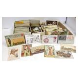 Large group of vintage postcards including real
