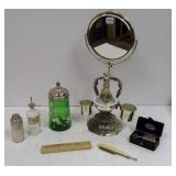 Group shaving items including ornate mirror with