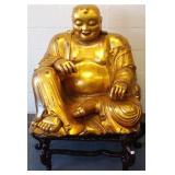 Approx. 30" x 36" carved gilt wood Buddha on 12"
