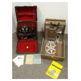 2 motion picture projectors- Bell & Howell