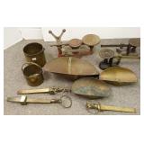 Group of antique scales with pans, brass buckets,