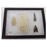 3 artifacts- 2 stone points- 1 iron arrowhead
