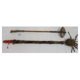 Flip-flop club & a beaded handle stone club