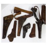 6 early leather revolver holsters- 3 with belts