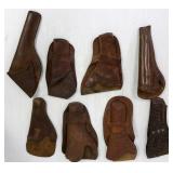 8 vintage handgun leather holsters including