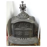 Ornate cast iron parlor stove (as seen)