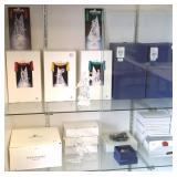 Large group of figures including Masquerade,