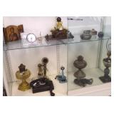 Group including Aladdin lamp, phones, Evans