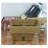 Group of advertising milk bottles & enamel pots