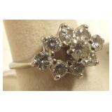 14k gold ring set with 9 diamonds- 1.00cwt, 3.7g