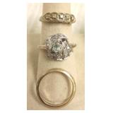 3- 14k rings set with diamonds, etc 9.3g total