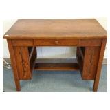 Oak library table with drawer