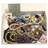 Group of costume jewelry including 14K gold ring -