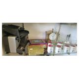 Group including brass clock, spice jars, flatware,