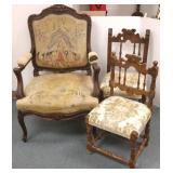 Antique carved armchair with needlepoint