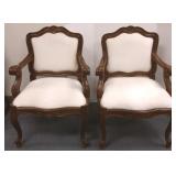 2 carved French style arm chairs