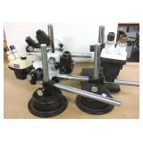 4 Bausch & Lomb etc microscopes on sliding stands