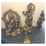 4 metal deity figures