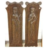 2 carved 42" oak figural plaques