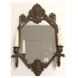 Figural mirror with candleholders