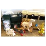 Group of dolls, wooden toys & small chest