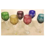 6 colored cut glass goblets- some with original