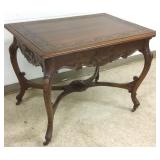 Antique fancy carved walnut parlor table