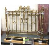 Fancy brass bed with rails