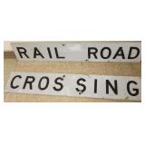 2 railroad crossing signs