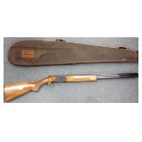 Charles Daly 20 gauge over/under shotgun with case
