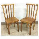2 rustic wood chairs